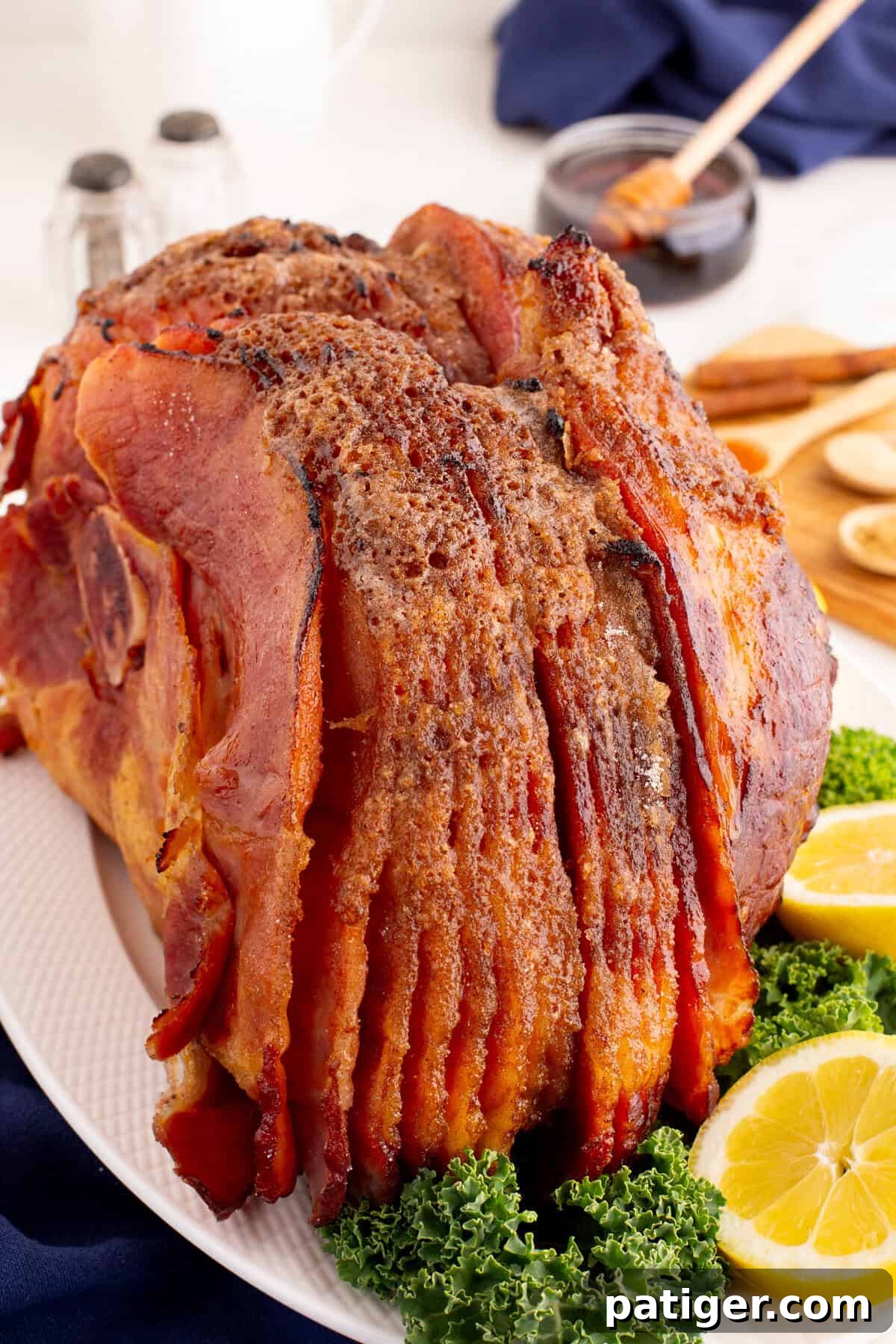 Golden Honey-Glazed Spiral Ham 9 A baked spiral honey ham, highlighting its golden-brown crust and uniform spiral slices.