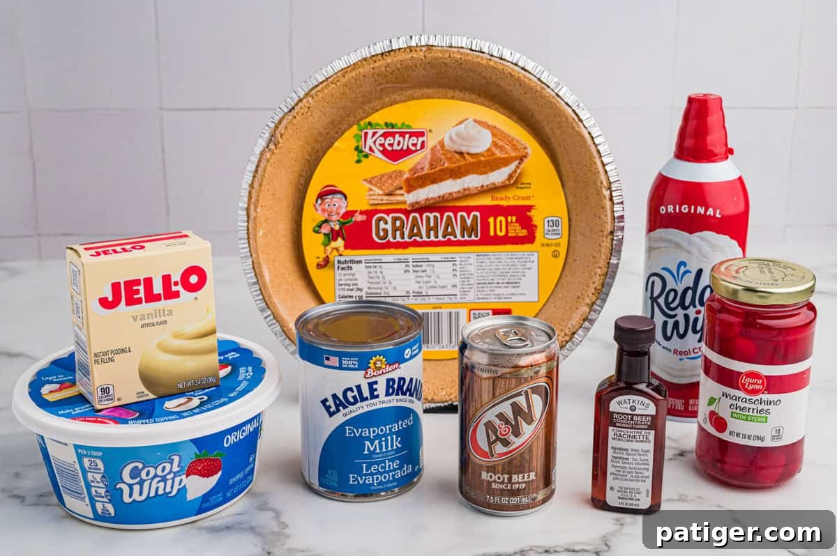 All ingredients for root beer float pie displayed: graham crust, pudding mix, Cool Whip, evaporated milk, root beer, root beer concentrae, whipped cream, and maraschino cherries.