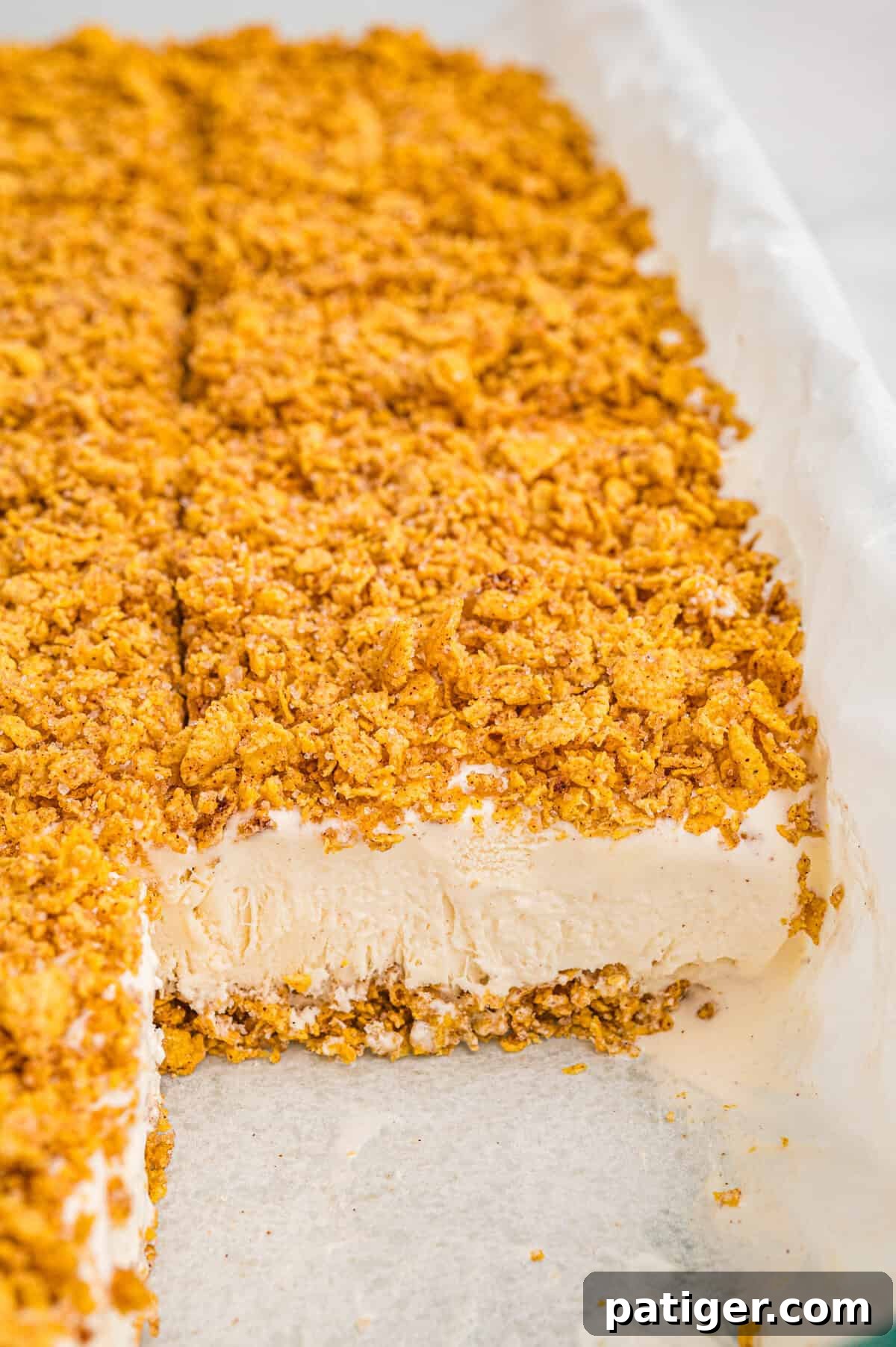 Golden Fried Ice Cream 10 Pan of sliced fried ice cream bars with golden cereal topping.