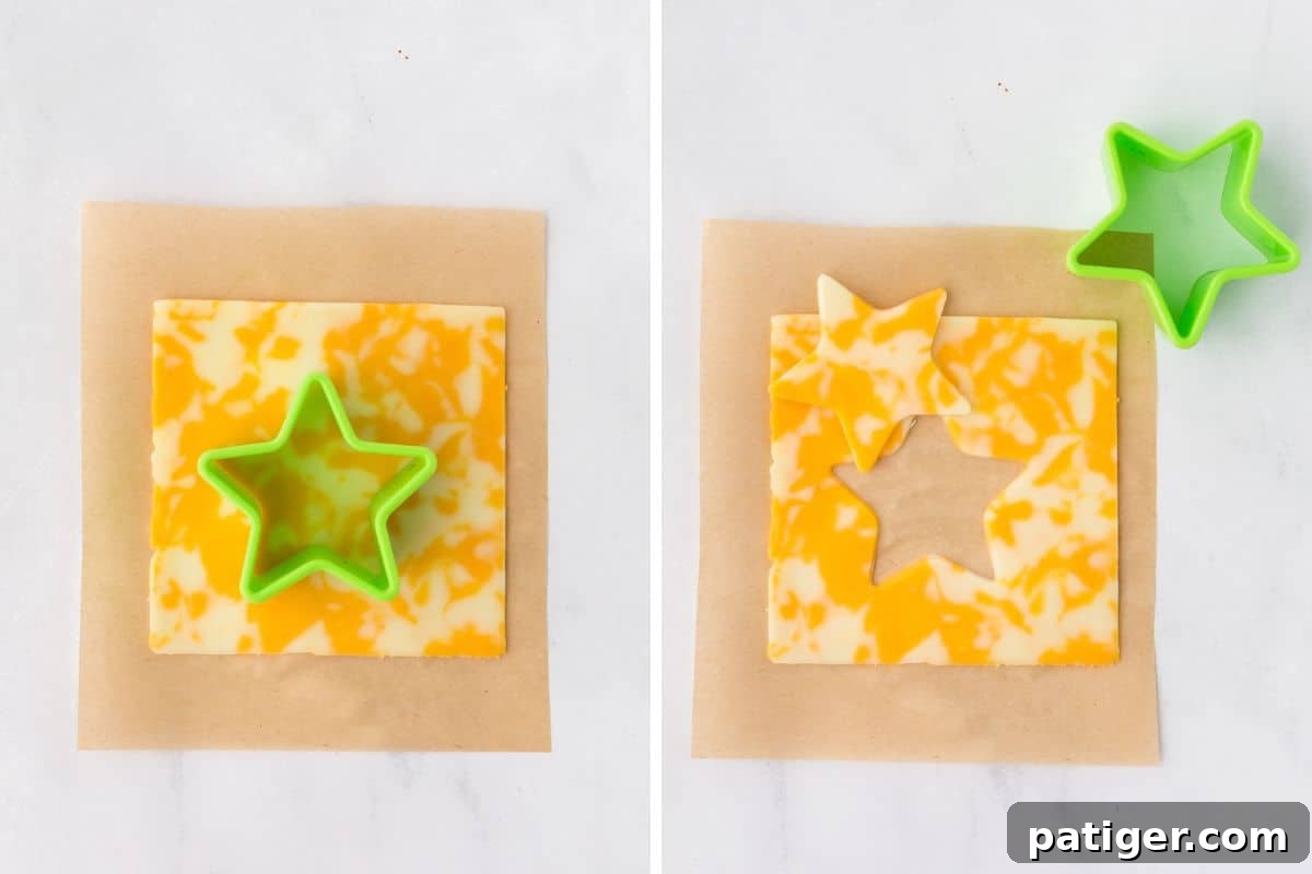 Star-shaped cutter used on marbled cheese slice.