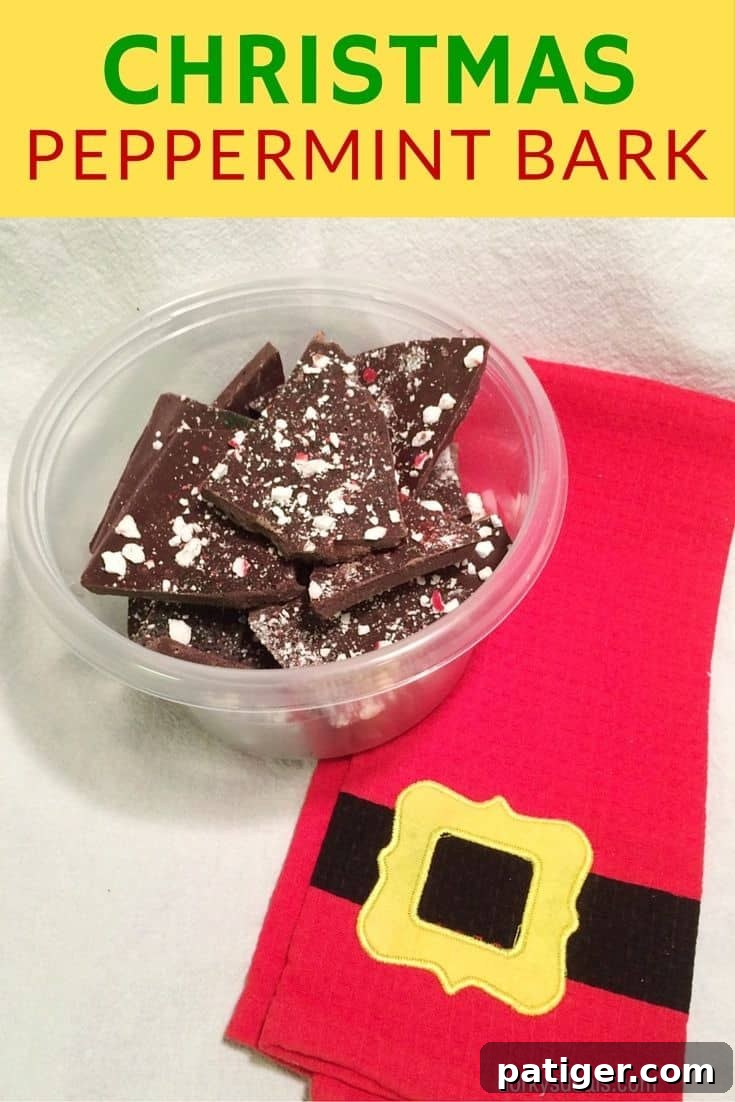 Holiday Peppermint Bark Treat 2 Christmas Peppermint Bark made with semi-sweet chocolate, peppermint candies, and red & green sprinkles, beautifully arranged for the holidays.