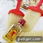 A Fireball Whiskey Cinnamon Roll Ice Pop, close-up, highlighting its delicious texture and inviting appearance, inspiring users to try the recipe.