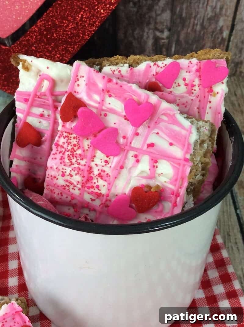 Pieces of Valentine's Day bark candy in white bowl.