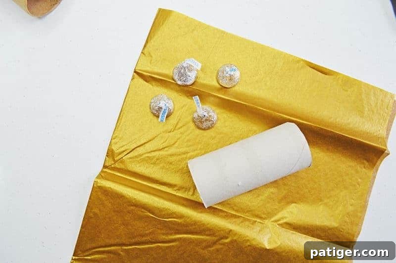 This fun Midnight Kisses New Year's Eve Party Poppers craft is easy to make with toilet paper rolls, tissue paper, ribbon, and the included printable label.