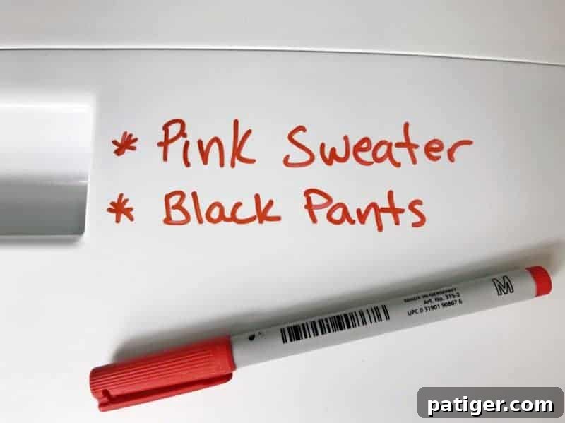 Discover a brilliant laundry hack: use a dry erase marker on your washer to note hang-dry items, saving clothes from the dryer.