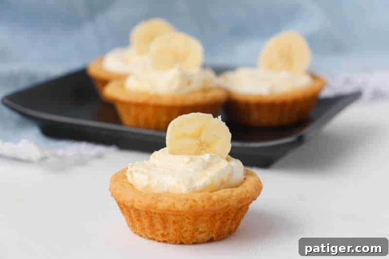 Creamy and delicious banana cream cookie cups are easy to make with sugar cookie dough and banana pudding mix. Even the little ones can get in the kitchen and help make these easy and delicious treats!