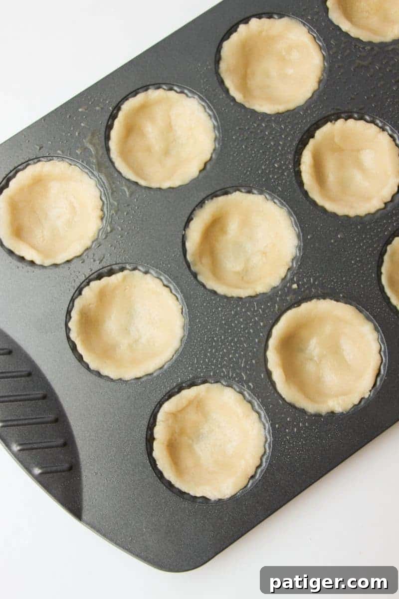 Moist, creamy, and delicious banana cream cookie cups are easy to make with sugar cookie dough and banana pudding mix. Even the little ones can get in the kitchen and help make these easy and delicious treats!