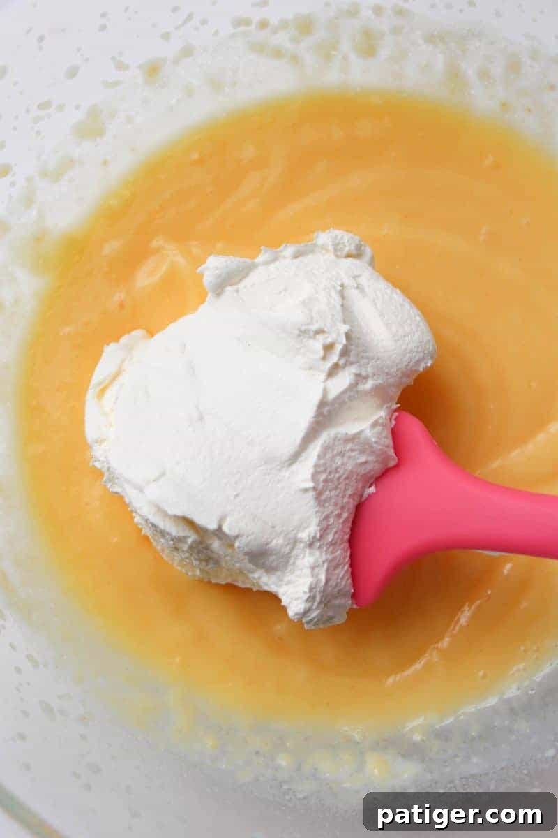 Moist, creamy, and delicious banana cream cookie cups are easy to make with sugar cookie dough and banana pudding mix. Even the little ones can get in the kitchen and help make these easy and delicious treats!