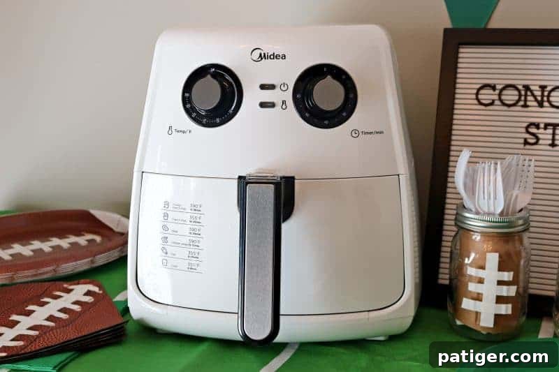 The Midea Air Fryer, showcasing its ability to create crispy, healthier Game Day fried foods.
