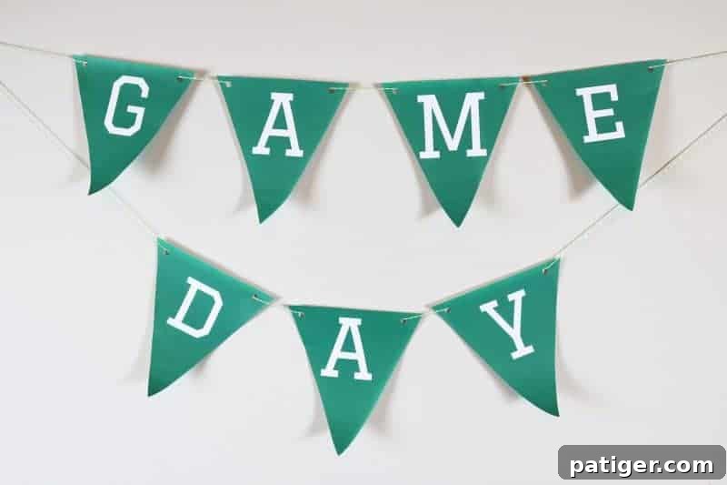 The completed Game Day banner hung on a wall, enhancing the party atmosphere.