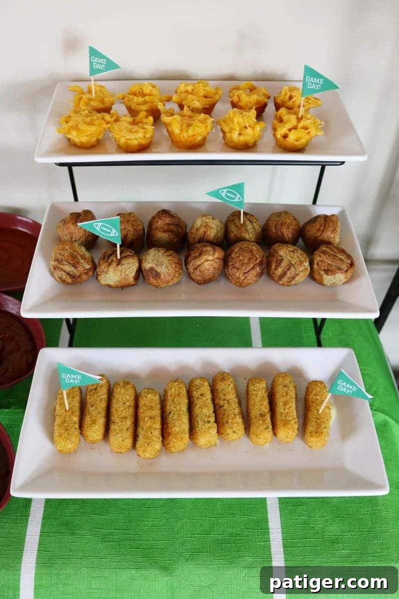 Game Day toothpick flag toppers inserted into hot appetizers on a serving platter.