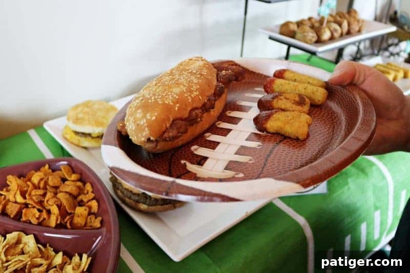 Guests enjoying the Big Game party with a focus on food and a festive atmosphere.