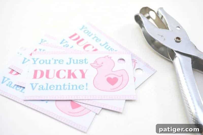 Are you looking for super cute free Valentine printables for your kids to give out this Valentine’s Day? This DIY “You’re Just Ducky” kids valentine is so stinking cute and is very inexpensive to make for the entire class. Plus, these homemade Valentines are something that will  put store-bought valentines to shame!