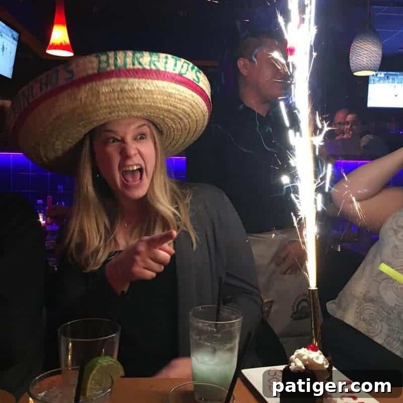Friends celebrating a birthday at Pancho's Burritos in New Milford, enjoying large burritos and signature Super Bulldog margaritas.