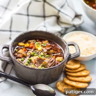 Beef Vegetable Soup served with crackers and cheese