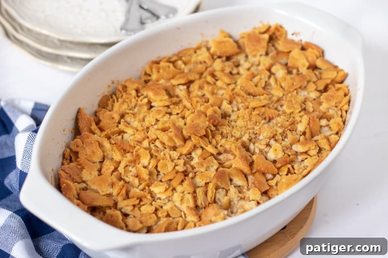 Classic Chicken Casserole with Ritz Crackers, a close-up of the crispy topping.