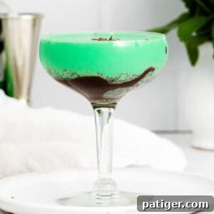 Grasshopper Cocktail layered in glass with chocolate sauce