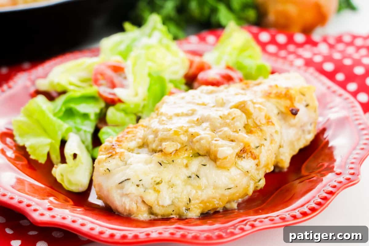A vibrant close-up of a smothered chicken breast on a red plate with a side salad, featuring overlaid text 'Smothered Chicken, one pot dinner'.