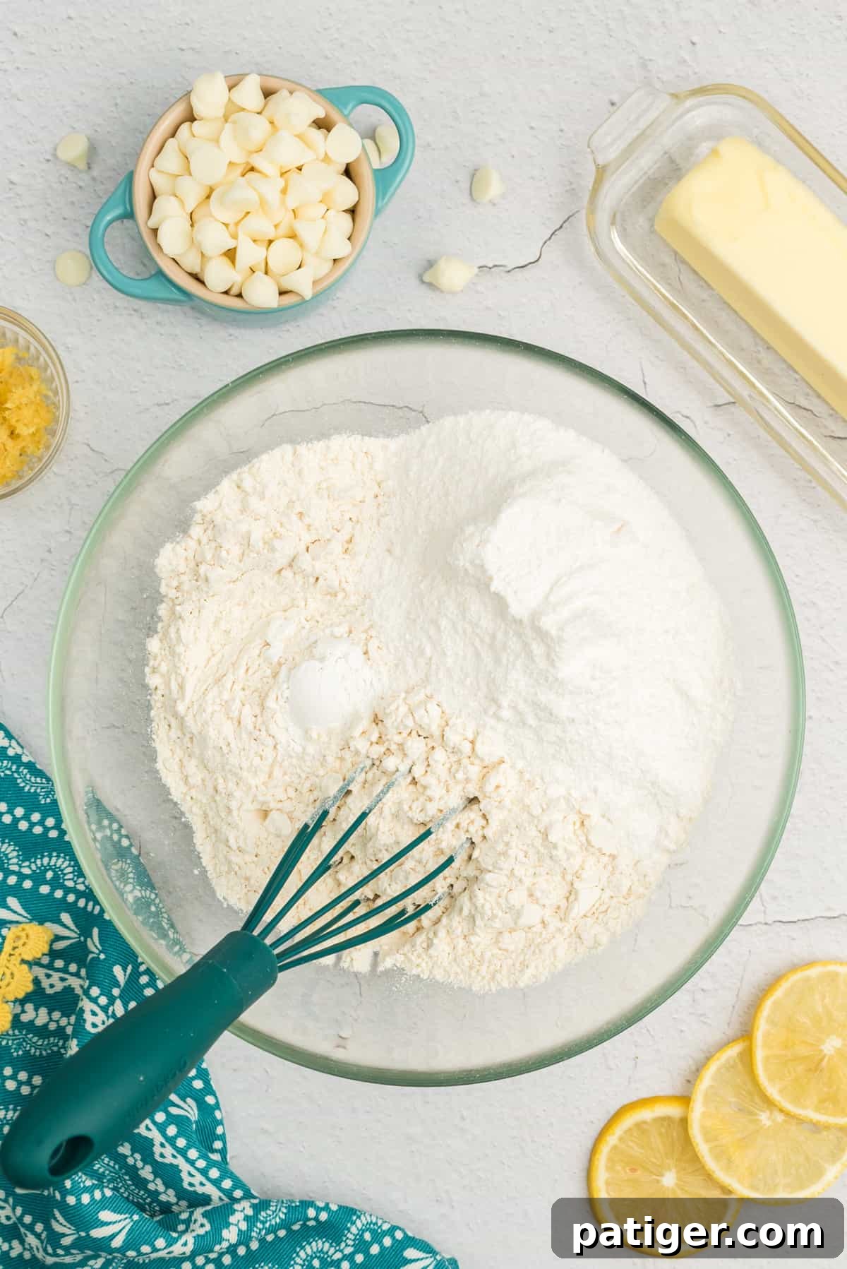 Dry ingredients for lemon pudding cookies in a bowl.