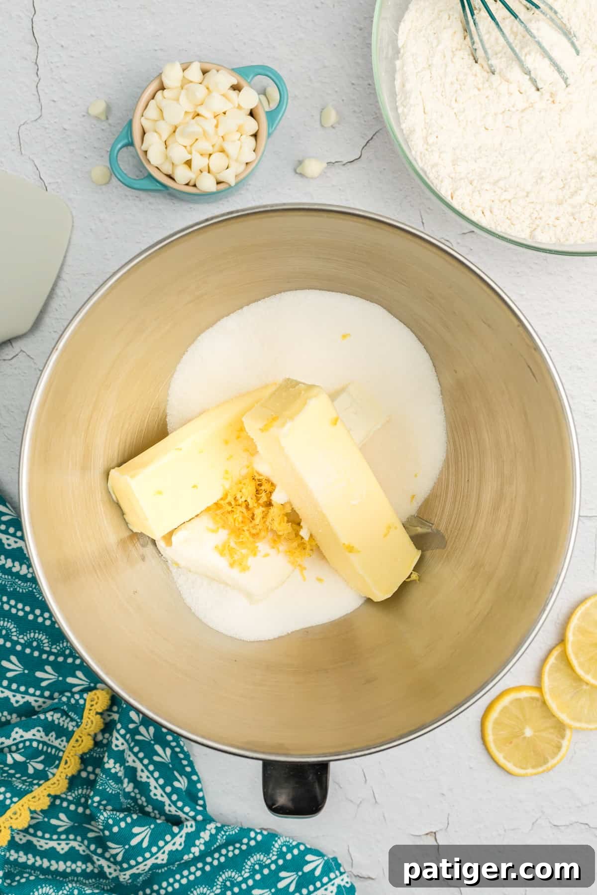 Creamed sugar and softened butter in a stand mixer bowl.