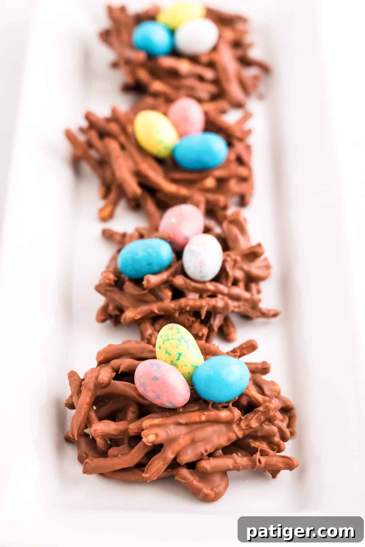 Colorful eggs in chow mein nests.