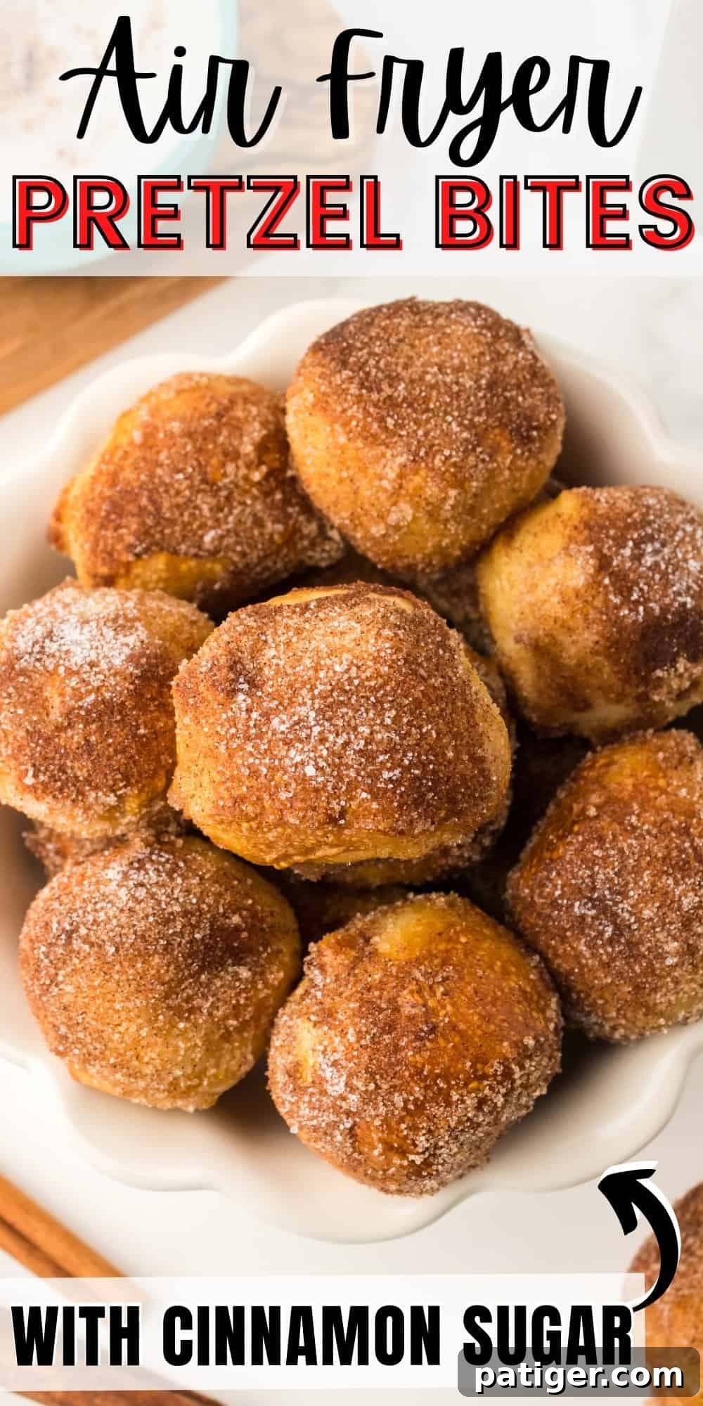 Large image of air fryer pretzel bites on a serving platter with dipping sauce, demonstrating a complete presentation.