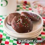 Homemade peppermint patties adorned with Christmas sprinkles, presented as a delightful holiday treat.