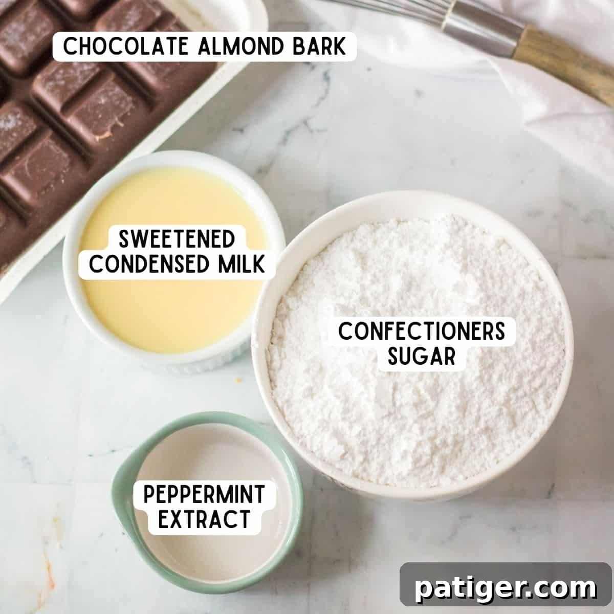 The essential ingredients for making homemade peppermint patty candy: a block of chocolate almond bark, a bag of confectioners' sugar, a can of sweetened condensed milk, and a small bottle of peppermint extract.