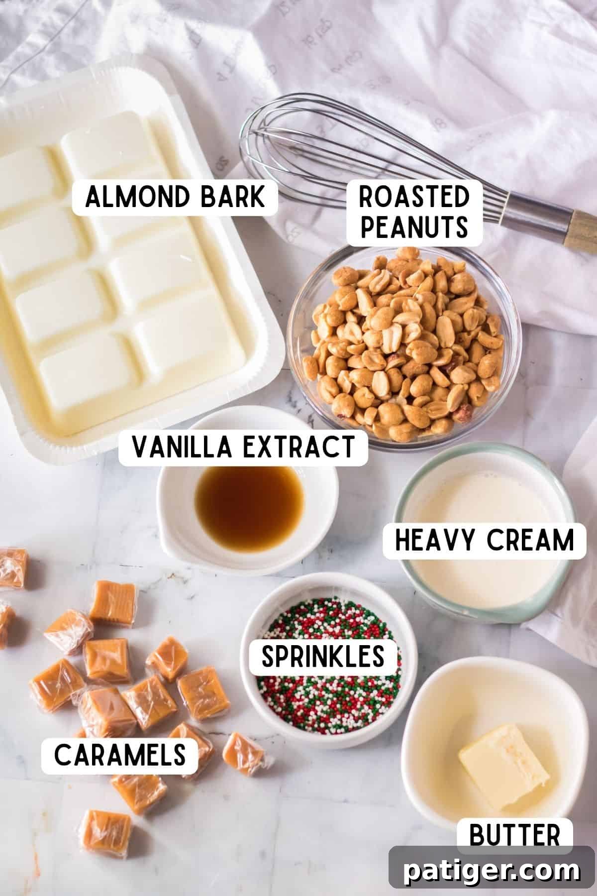 Ingredients laid out for making Polar Bear Paws candies, including caramels, peanuts, butter, cream, and almond bark.