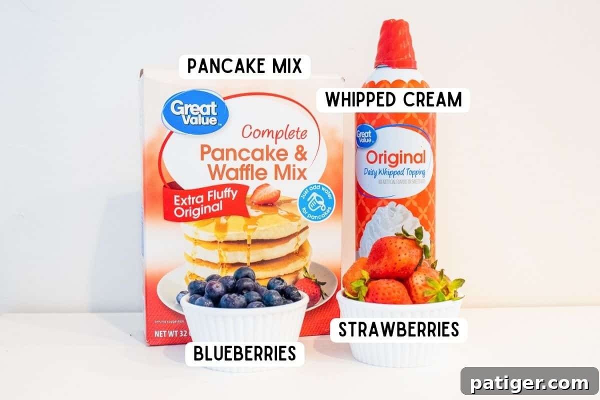 Cottontail Pancakes 4 Box of pancake mix, can of whipped cream, bowl of blueberries, bowl of strawberries.