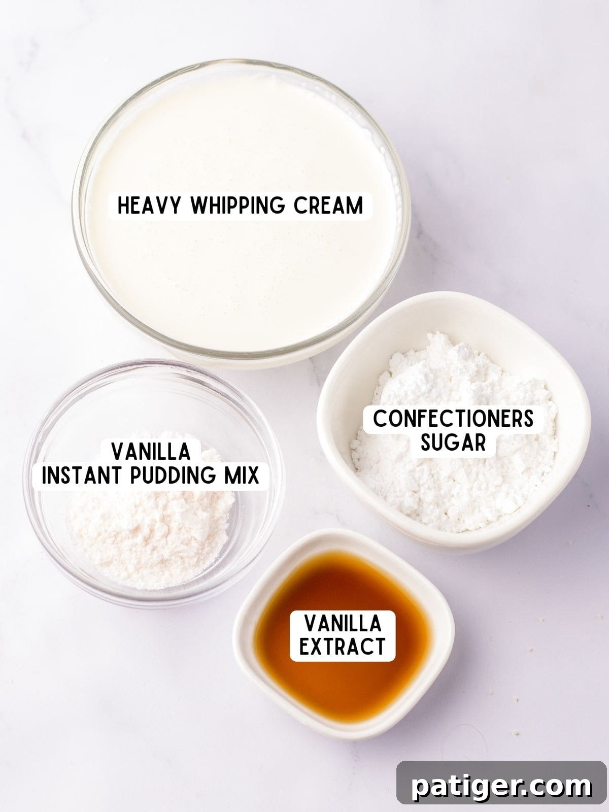 Arrangement of heavy whipping cream, vanilla instant pudding mix, confectioners sugar, and vanilla extract – all essential ingredients for homemade cool whip.