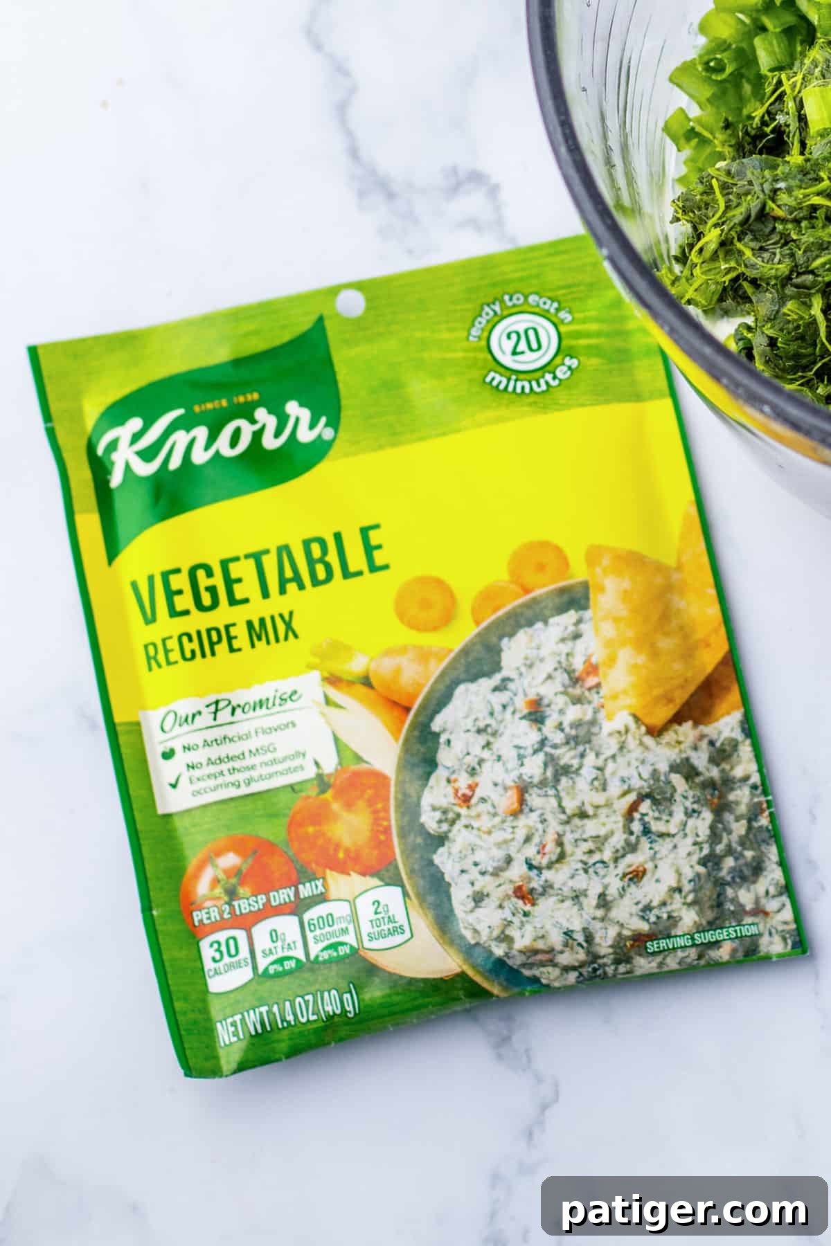 Knorr vegetable recipe mix packet with picture of spinach dip and chips on it.