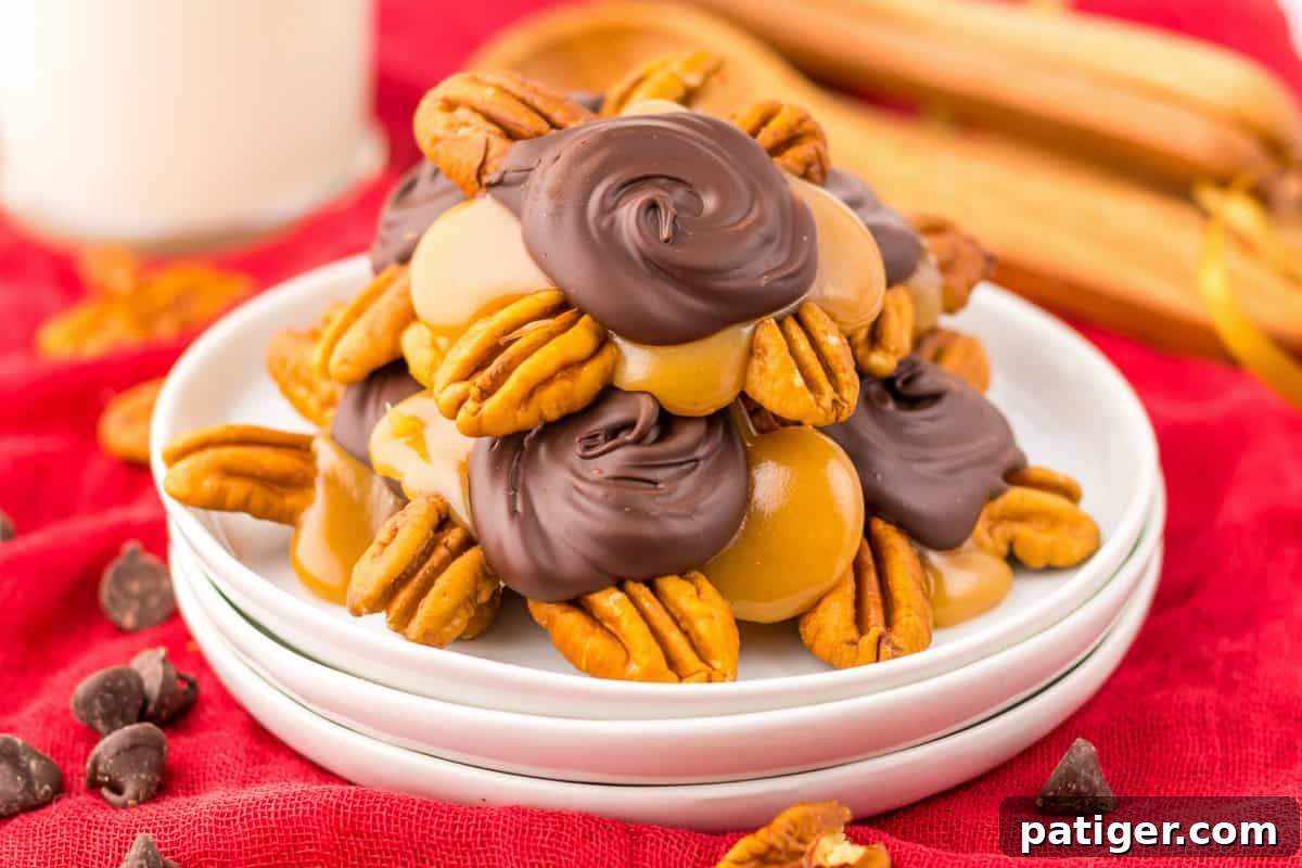 Homemade pecan turtles clusters, with glossy caramel and dark chocolate on crunchy toasted pecans.