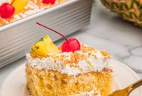 Tropical Piña Colada Layer Cake with Rum-Soaked Pineapple
